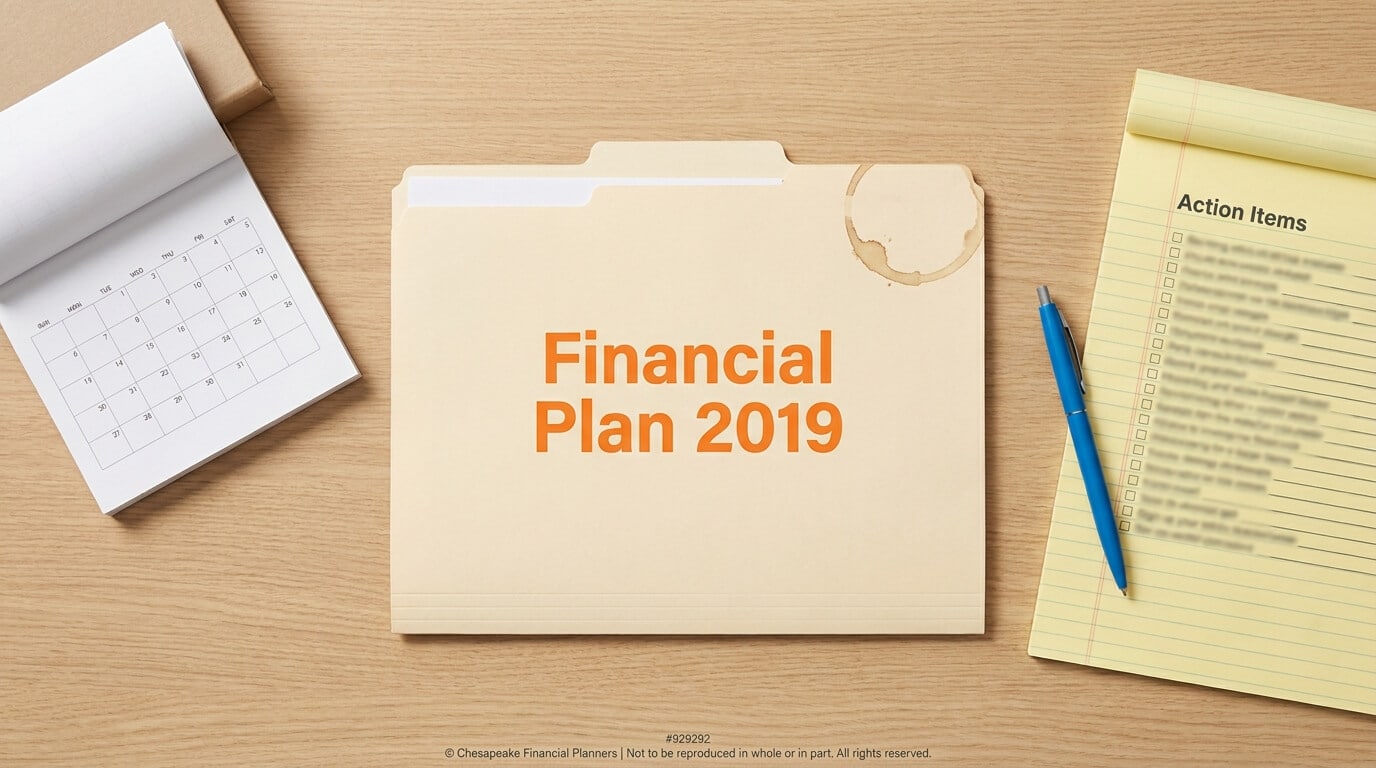 Folder labeled 'Financial Plan 2019' on a wooden desk with a calendar and an action-items notepad nearby.